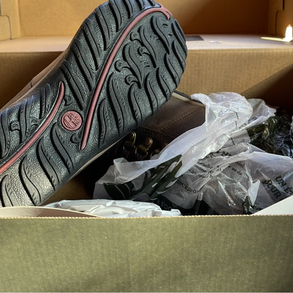 Brand new, in box, Timberland hiking boots. Size 7.5